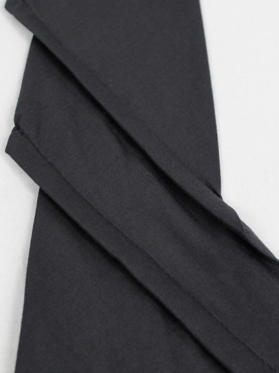 Christophe Coppens dark navy twisted tie folded diagonally in origami style (5)