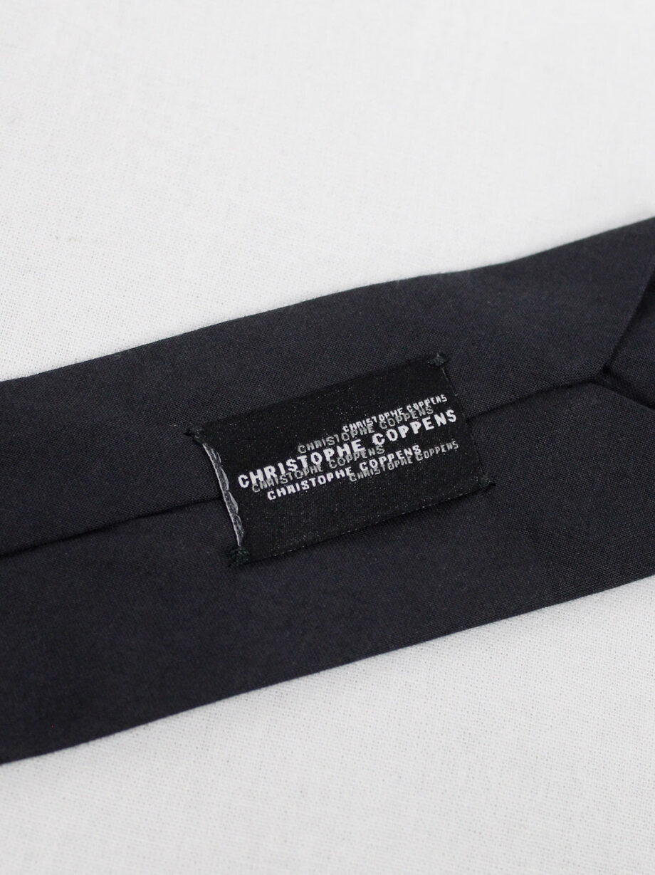 Christophe Coppens dark navy twisted tie folded diagonally in origami style (9)