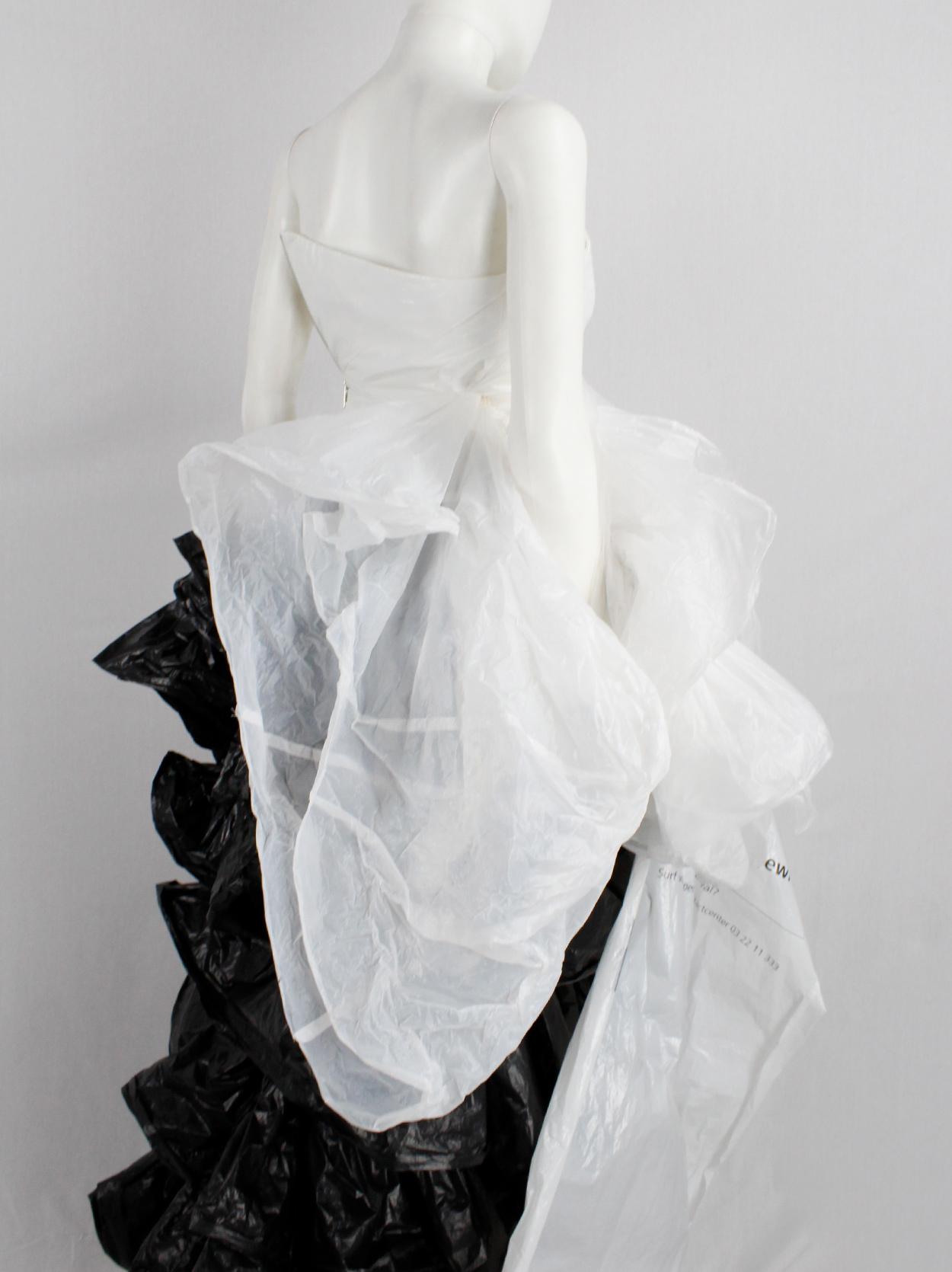A.F. Vandevorst bustier made of trashbags with large bow and sash ...