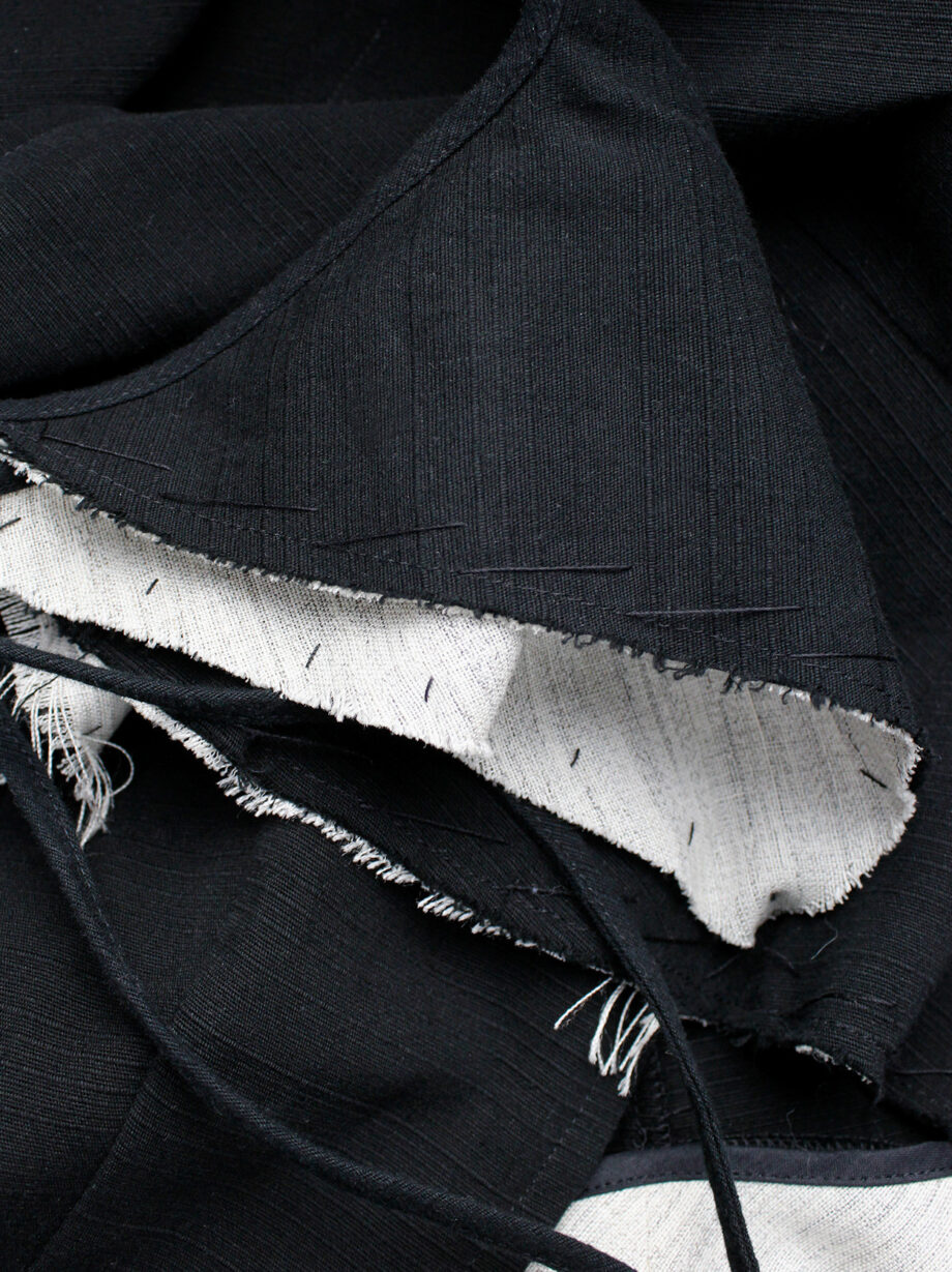 Yohji Yamamoto black peplum jacket with white frayed trims and cut out sleeves spring 2000 (32)