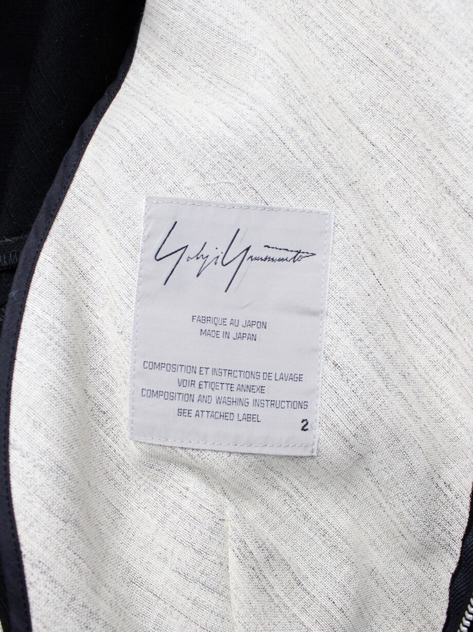 Yohji Yamamoto black peplum jacket with white frayed trims and cut out sleeves spring 2000 (33)