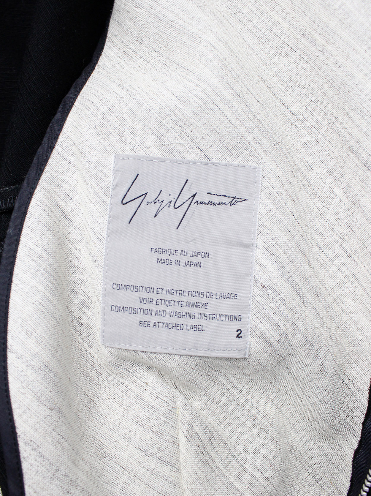 Yohji Yamamoto black peplum jacket with white frayed trims and cut out ...