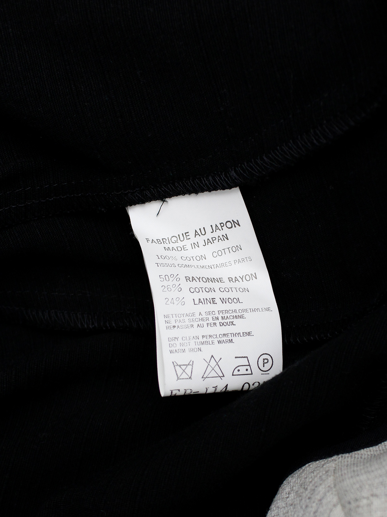 Yohji Yamamoto black peplum jacket with white frayed trims and cut out ...
