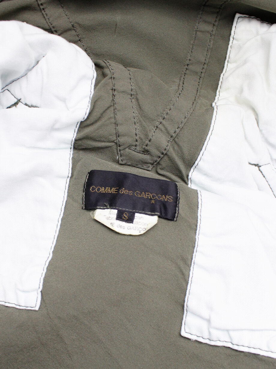 vintage Comme des Garcons khaki green blazer fused with a long draped underlayer fall 2009 (16)