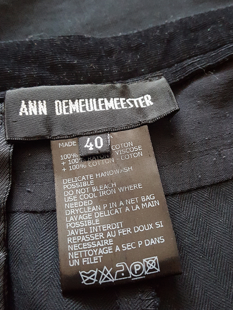 Ann Demeulemeester black trousers with torn waist - V A N II T A S