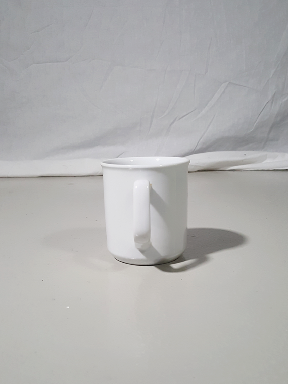 vintage Lieve Van Gorp white coffee mug with distorted logo 174109
