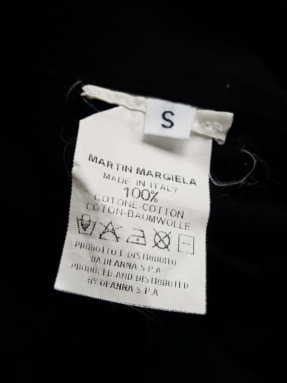 vintage Maison Martin Margiela black t-shirt hanging on the front of the body spring 2003 111312