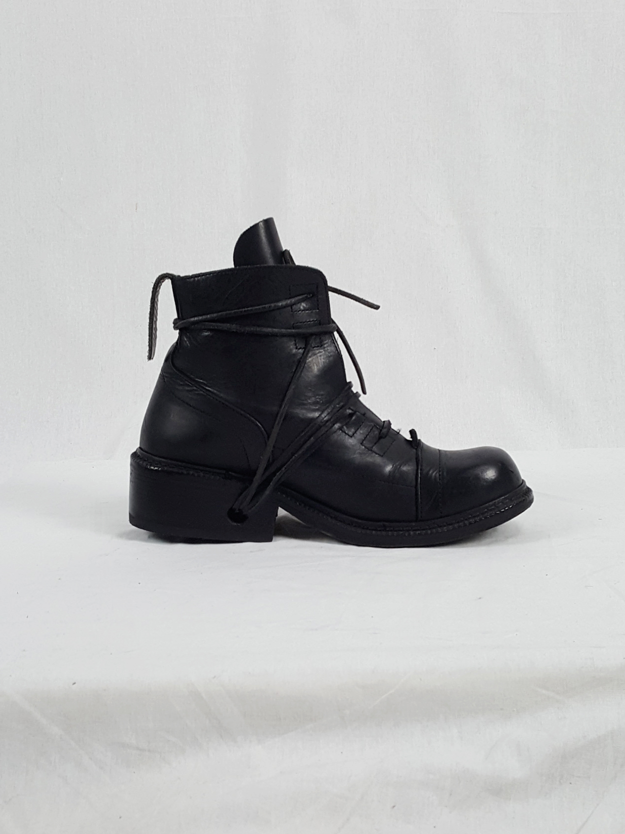 Dirk Bikkembergs black tall lace-up boots with laces through the soles ...