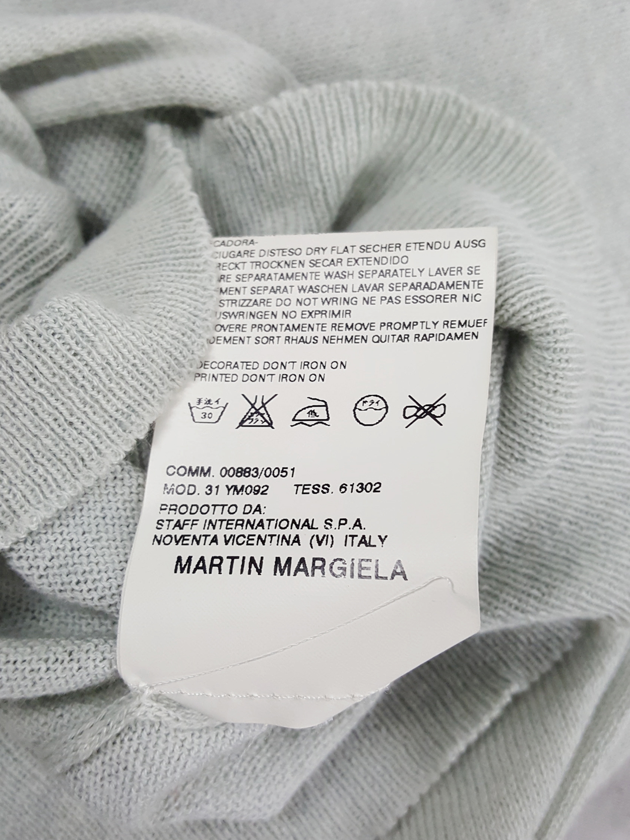 Maison Martin Margiela sage green sleeveless jumper worn sideways ...