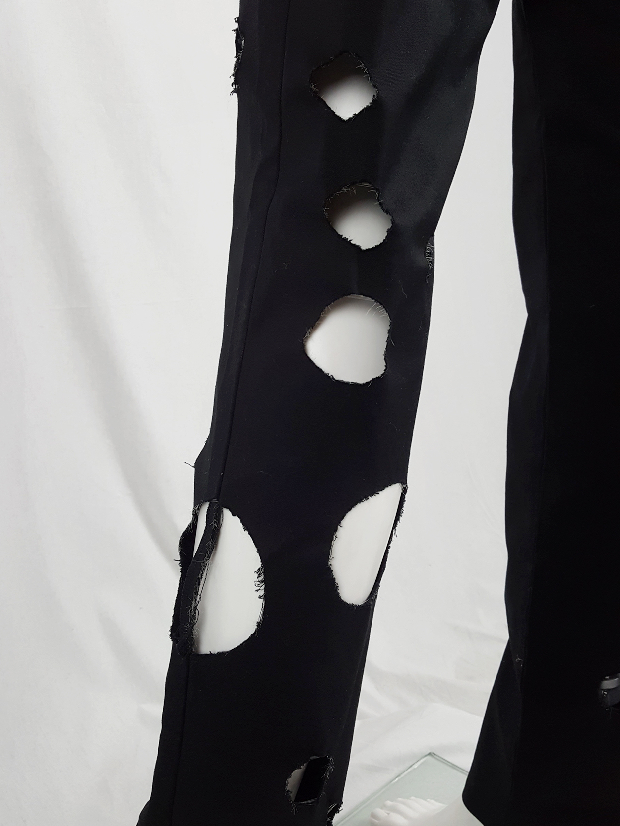 Yohji Yamamoto black trousers with circle cutouts — spring 2010 - V A N ...