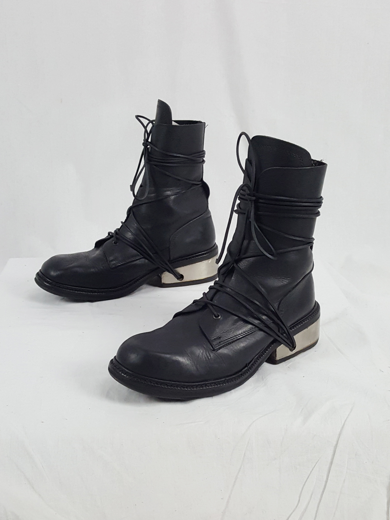 Dirk Bikkembergs black tall boots with laces through the metal