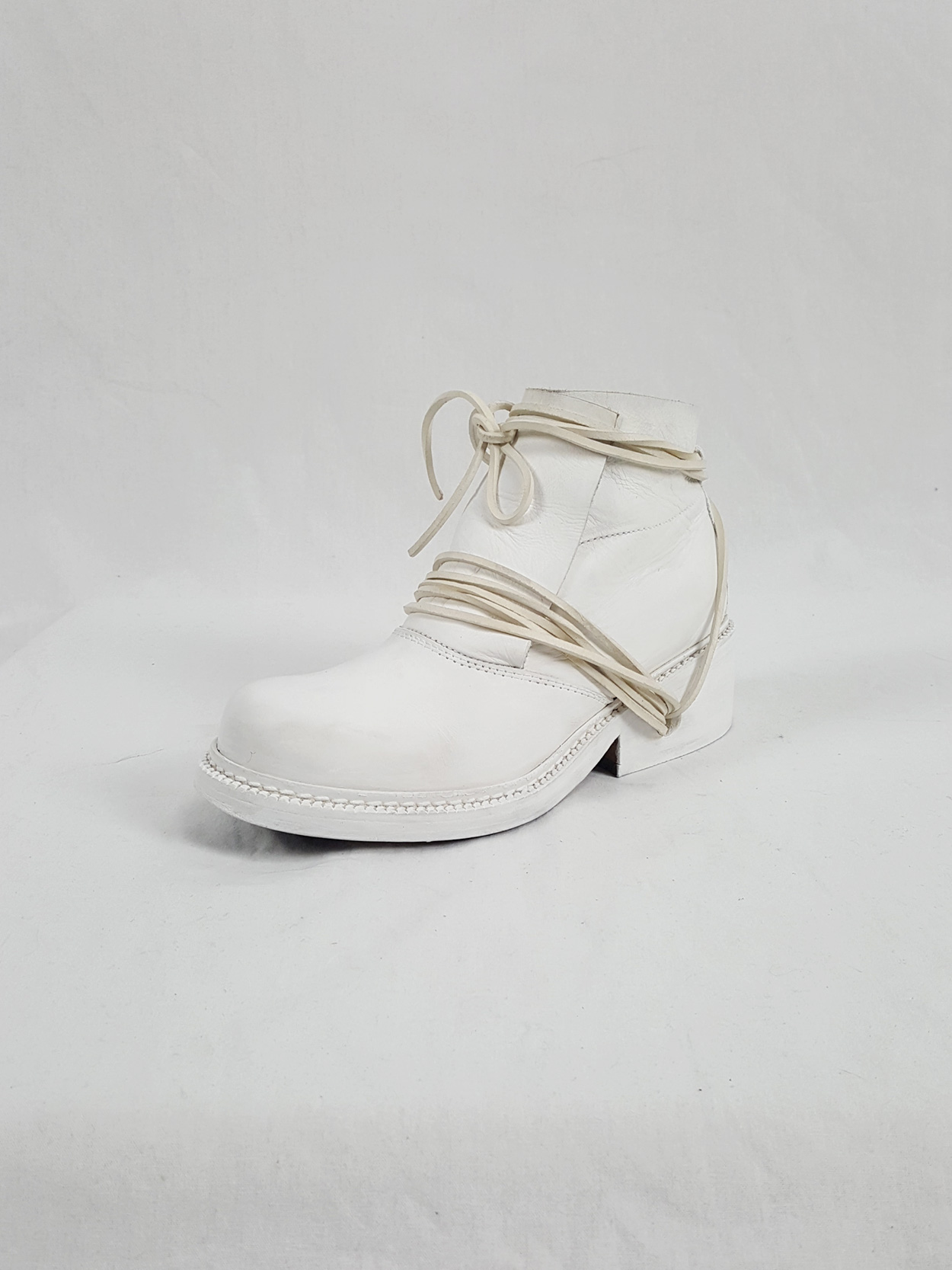 Dirk Bikkembergs white boots with front flap and laces through the ...