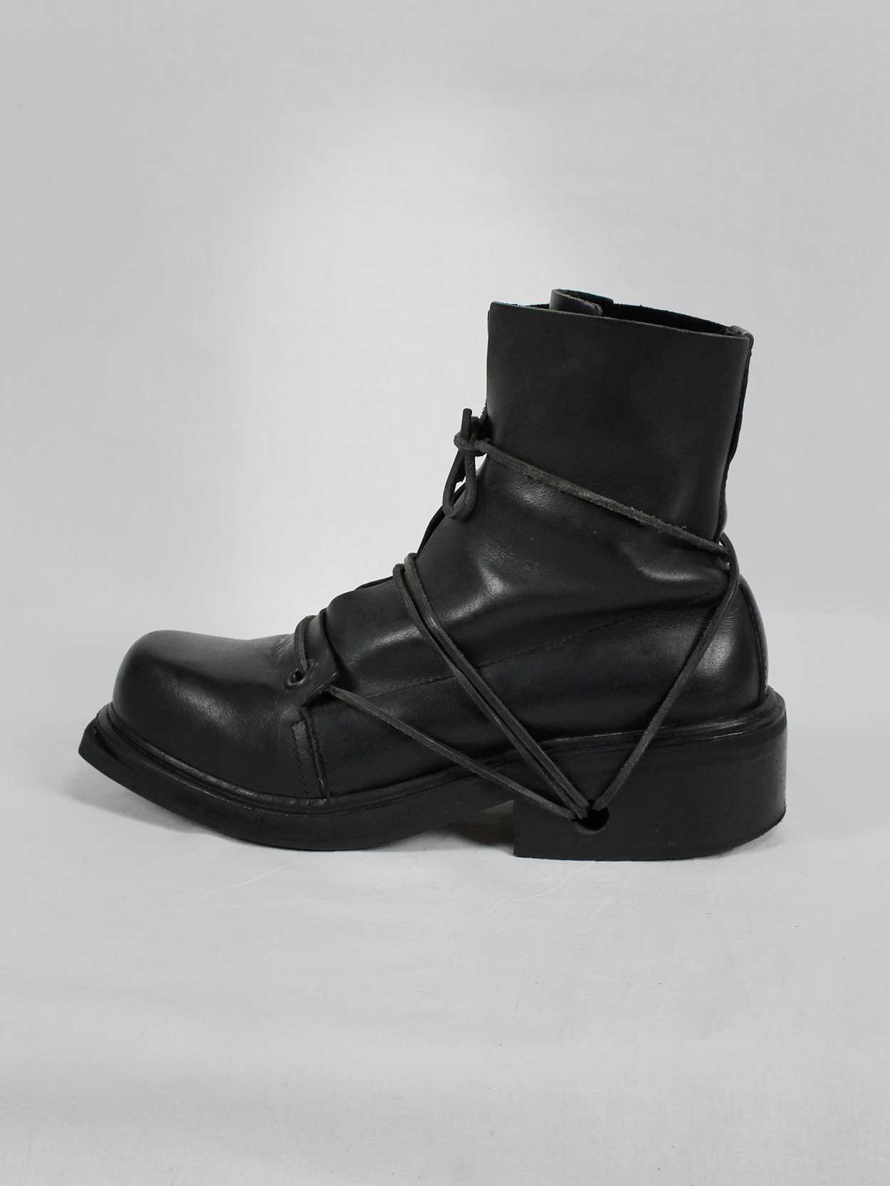 Dirk Bikkembergs black mountaineering boots with laces through the ...