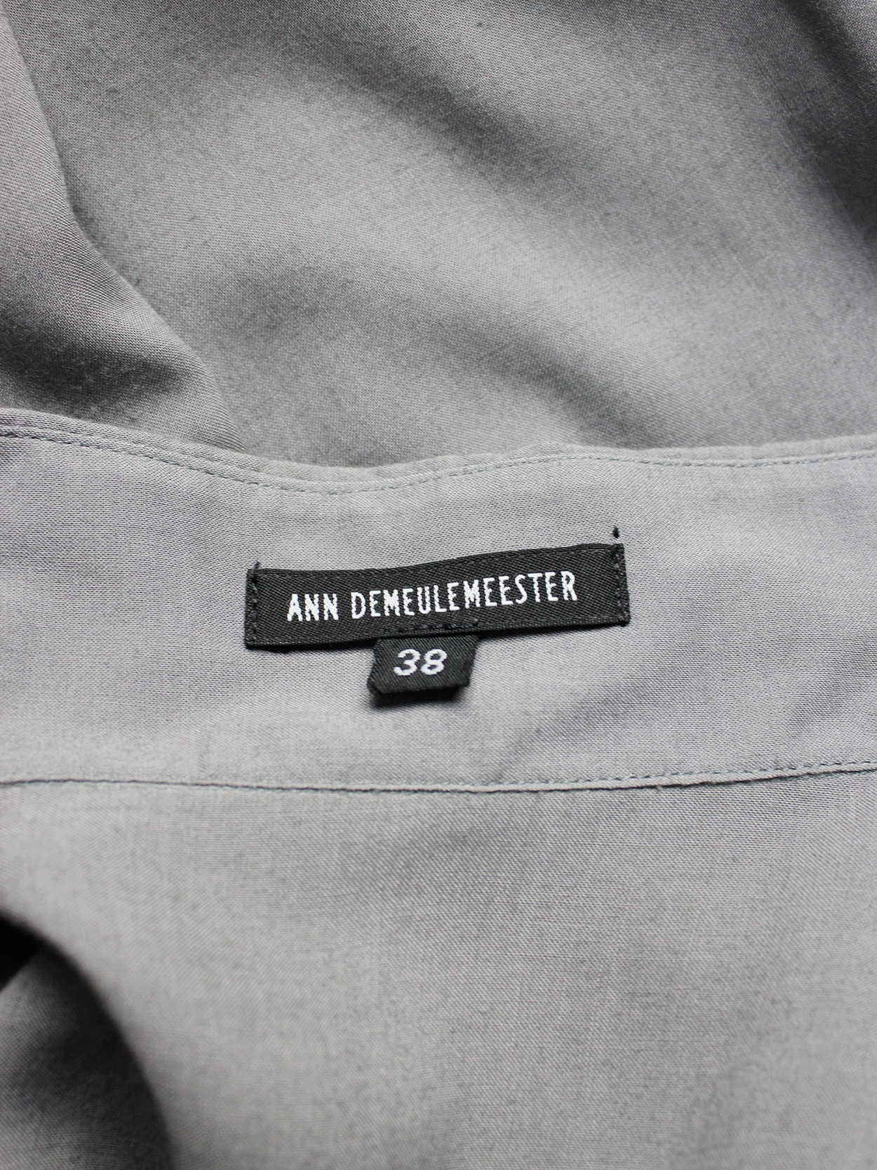 vaniitas vintage Ann Demeulemeester grey long shirt with many black buttons 3563