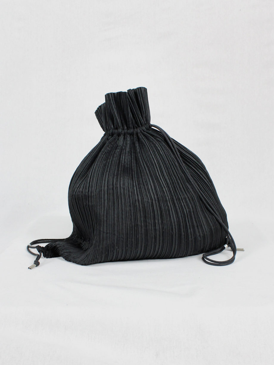 vaniitas Issey Miyake black pleated drawstring backpack 4840