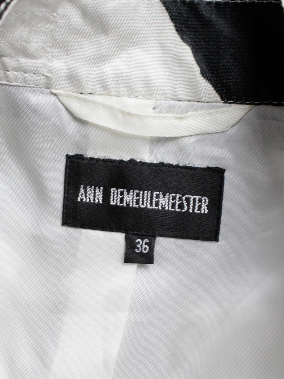 Ann Demeulemeester black and white fencing jacket with side button closure runway spring 2011 (23)