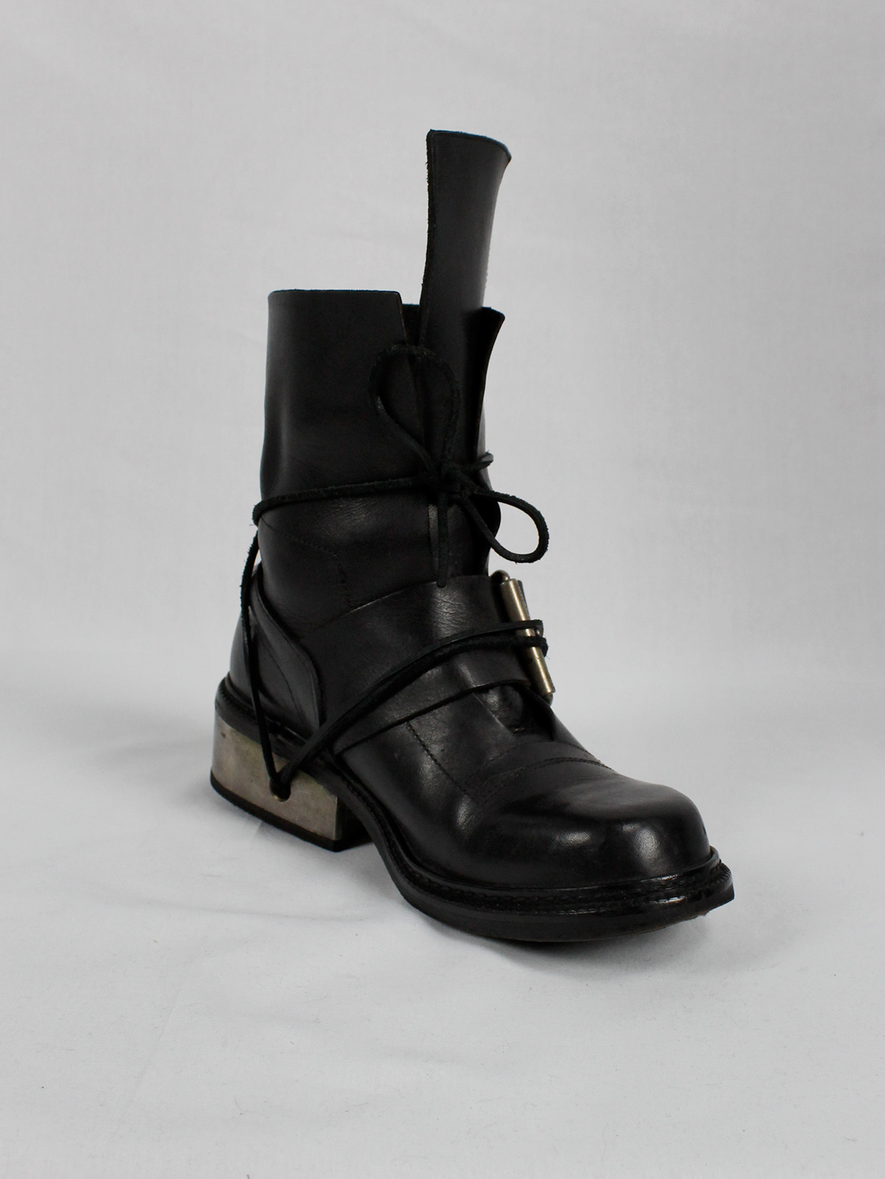 Dirk Bikkembergs black tall boots with belt and laces through the metal ...
