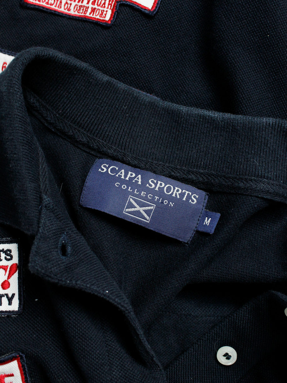 Walter Van Beirendonck for Scapa dark blue ‘Formula 1’ poloshirt covered with patches (Copy) (1)