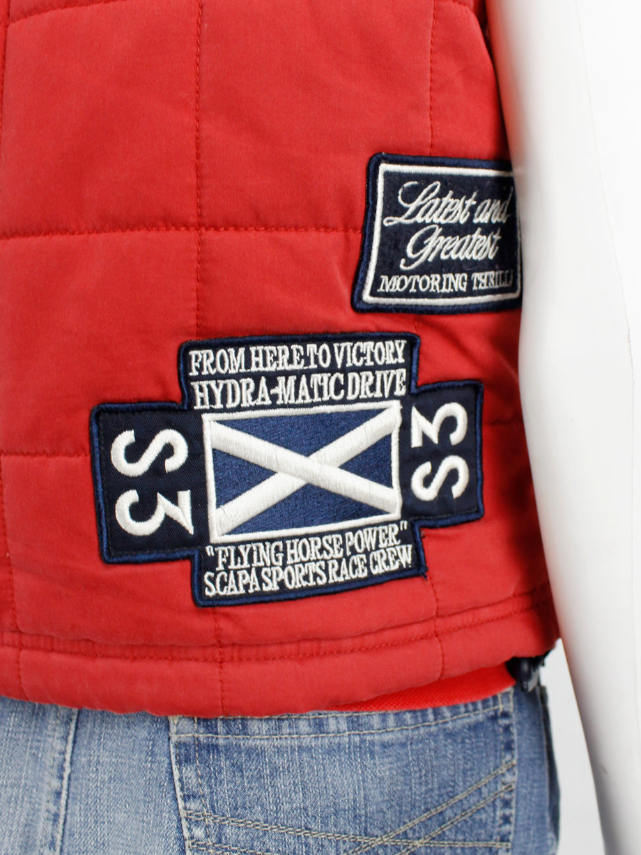 Walter Van Beirendonck for Scapa red ‘Formula 1’ bodywarmer with blue patches (1)