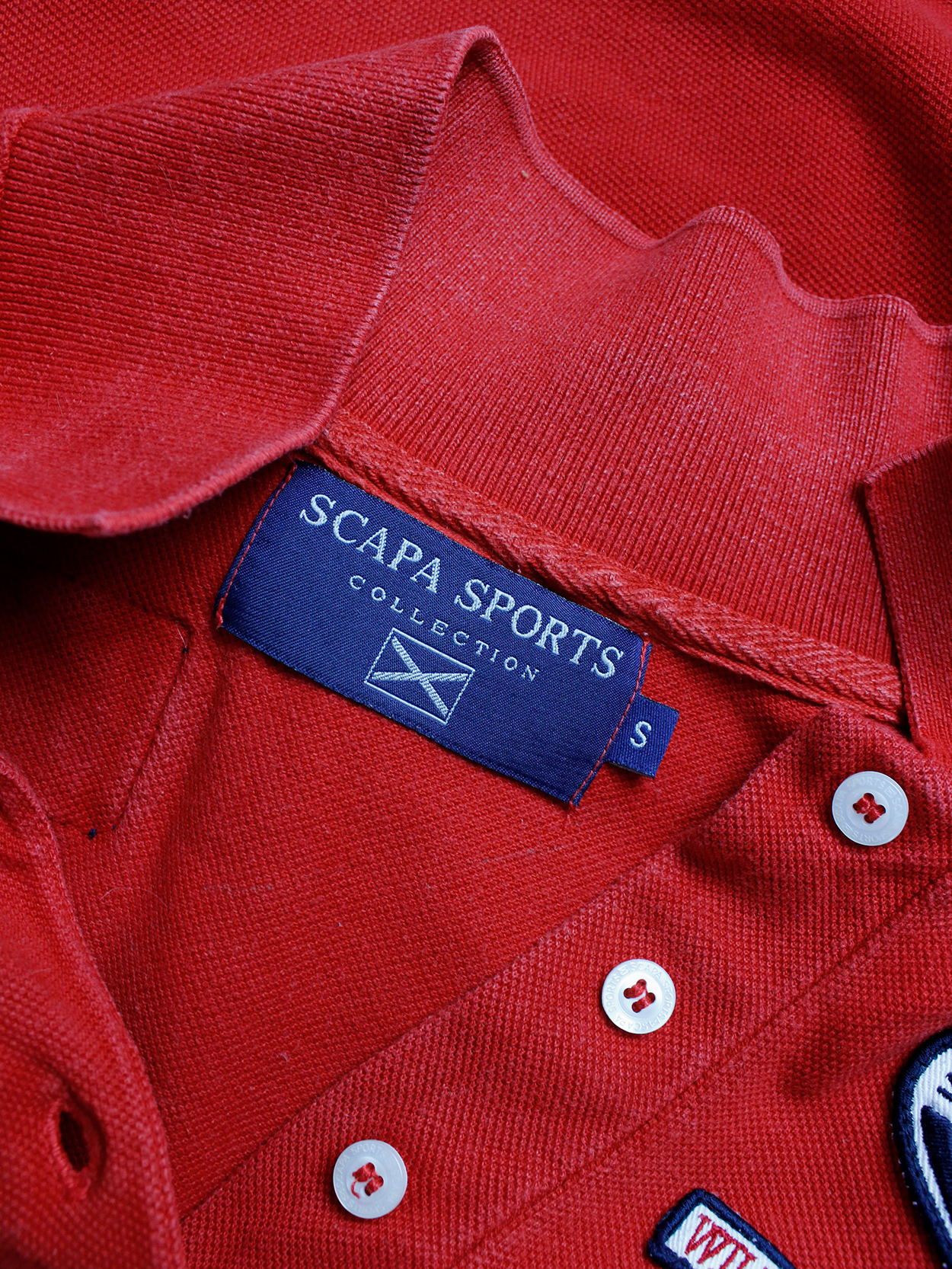 Walter Van Beirendonck for Scapa red ‘Formula 1’ poloshirt covered with patches (1)