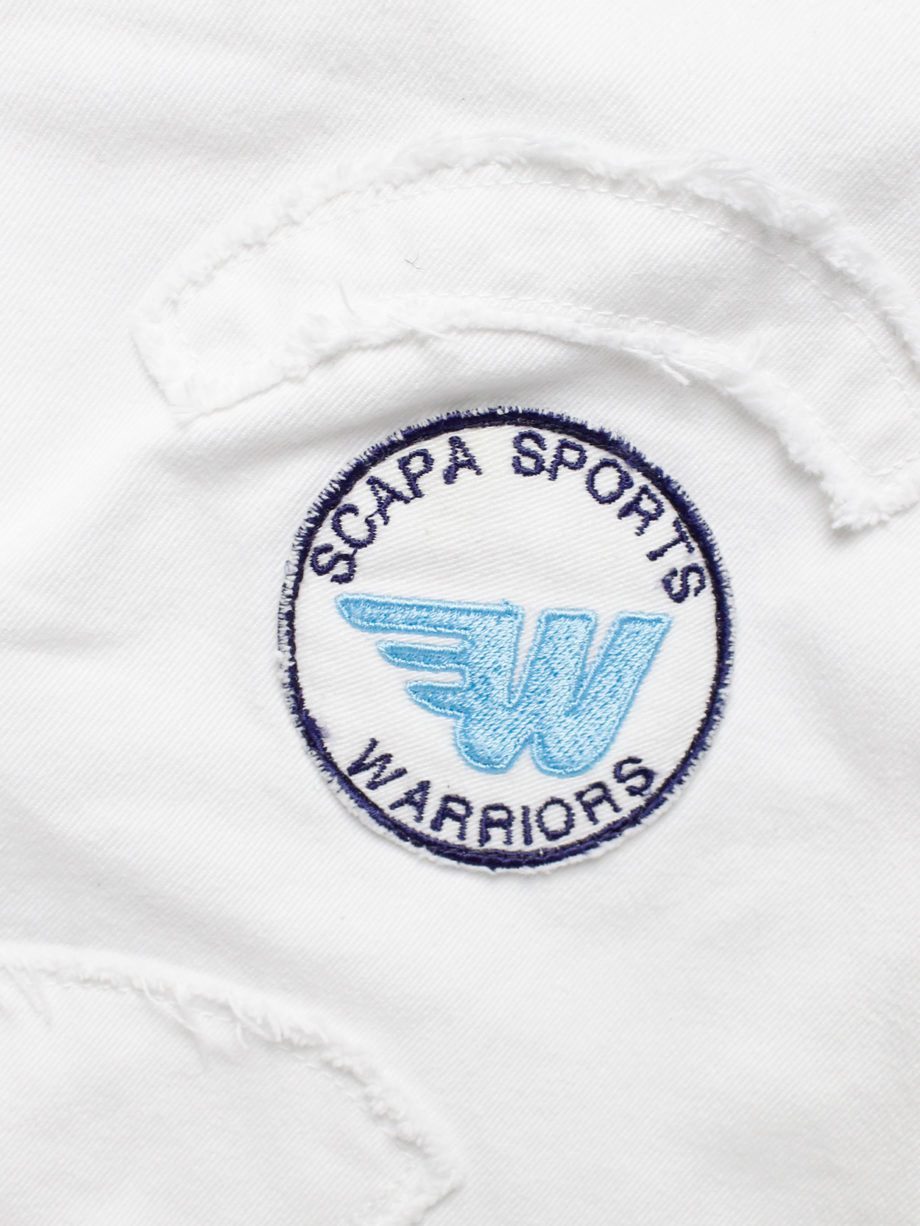 Walter Van Beirendonck for Scapa white ‘Formula 1’ mini skirt with patches (1)