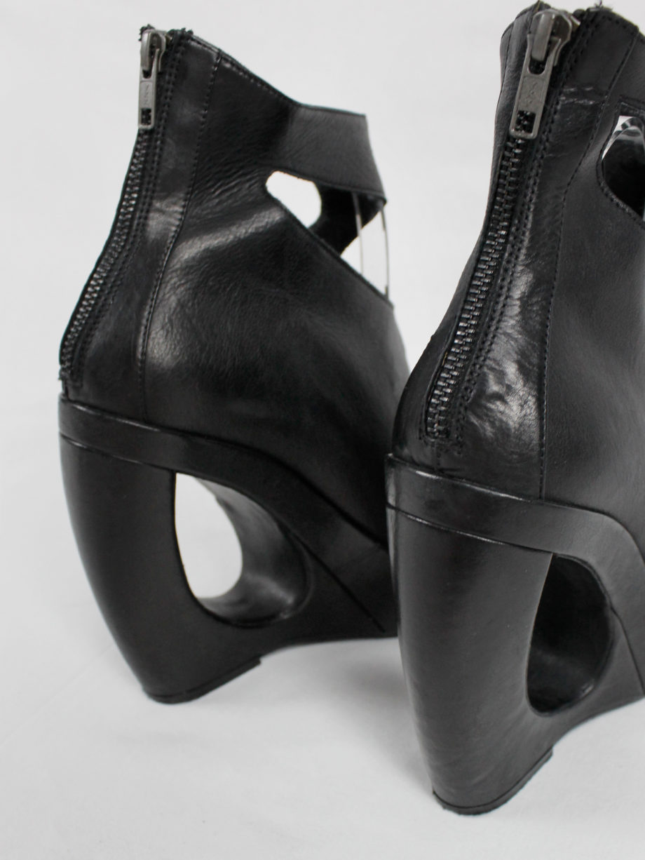 Ann Demeulemeester black platform boots with cut-out curved heel (44) — spring 2013