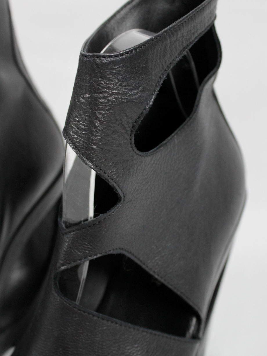 Ann Demeulemeester black platform boots with cut-out curved heel (47) — spring 2013