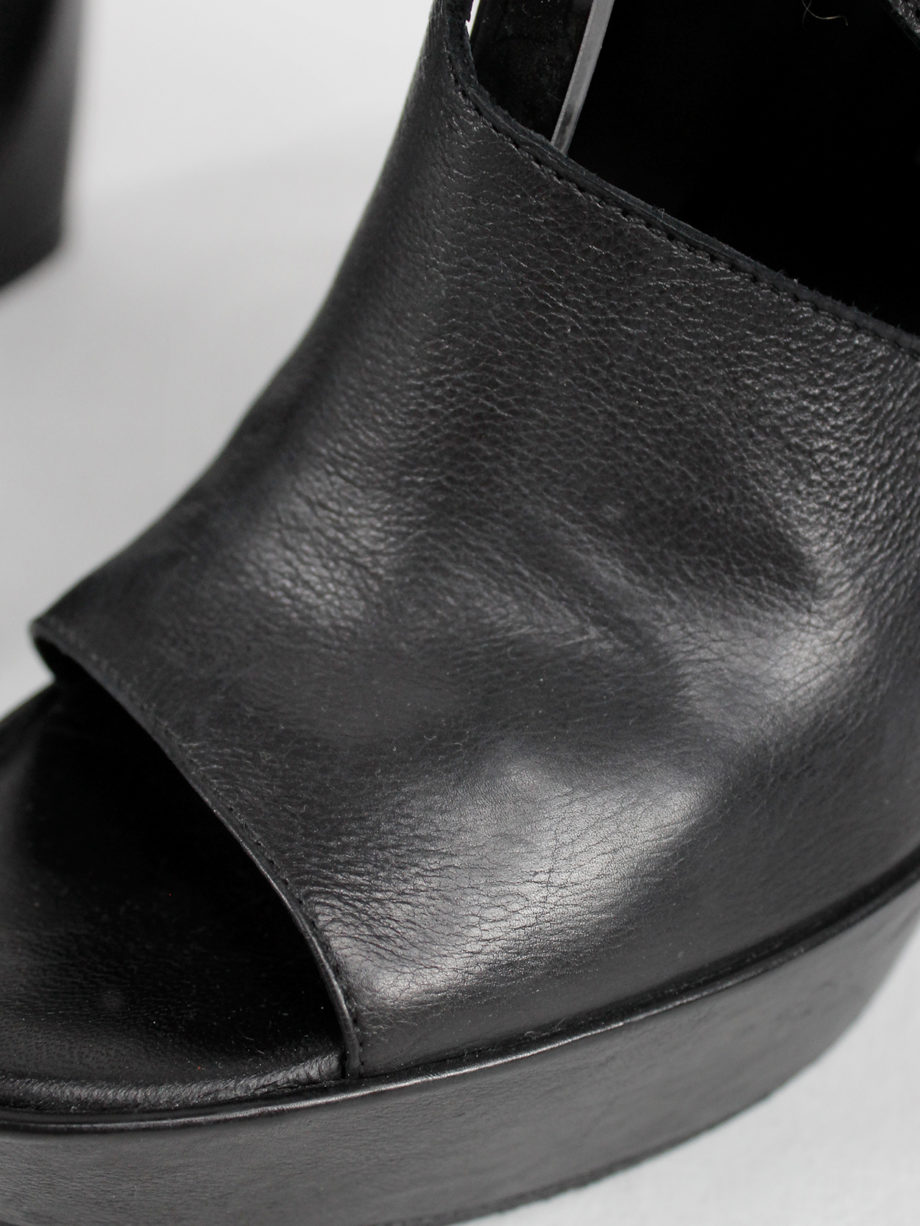 Ann Demeulemeester black platform boots with cut-out curved heel (48) — spring 2013