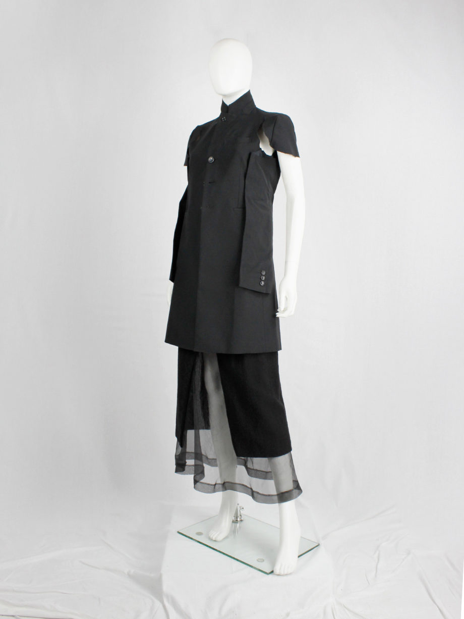 Comme des Garcons black deconstructed jacket with cut off sleeves sewn on the sides spring 2012 (1)
