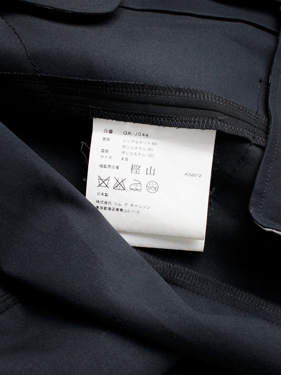 Comme des Garcons black deconstructed jacket with cut off sleeves sewn on the sides spring 2012 (11)