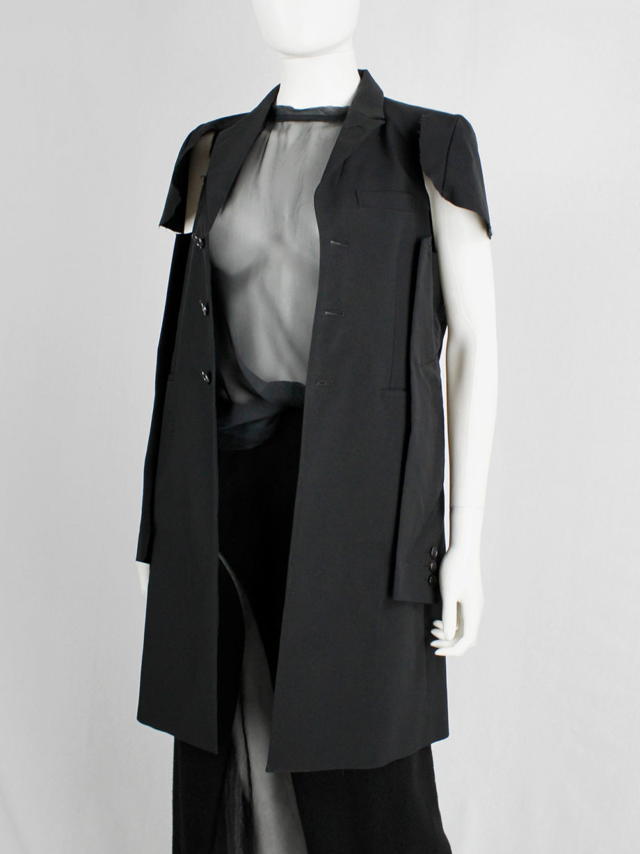 Comme des Garcons black deconstructed jacket with cut off sleeves sewn on the sides spring 2012 (23)