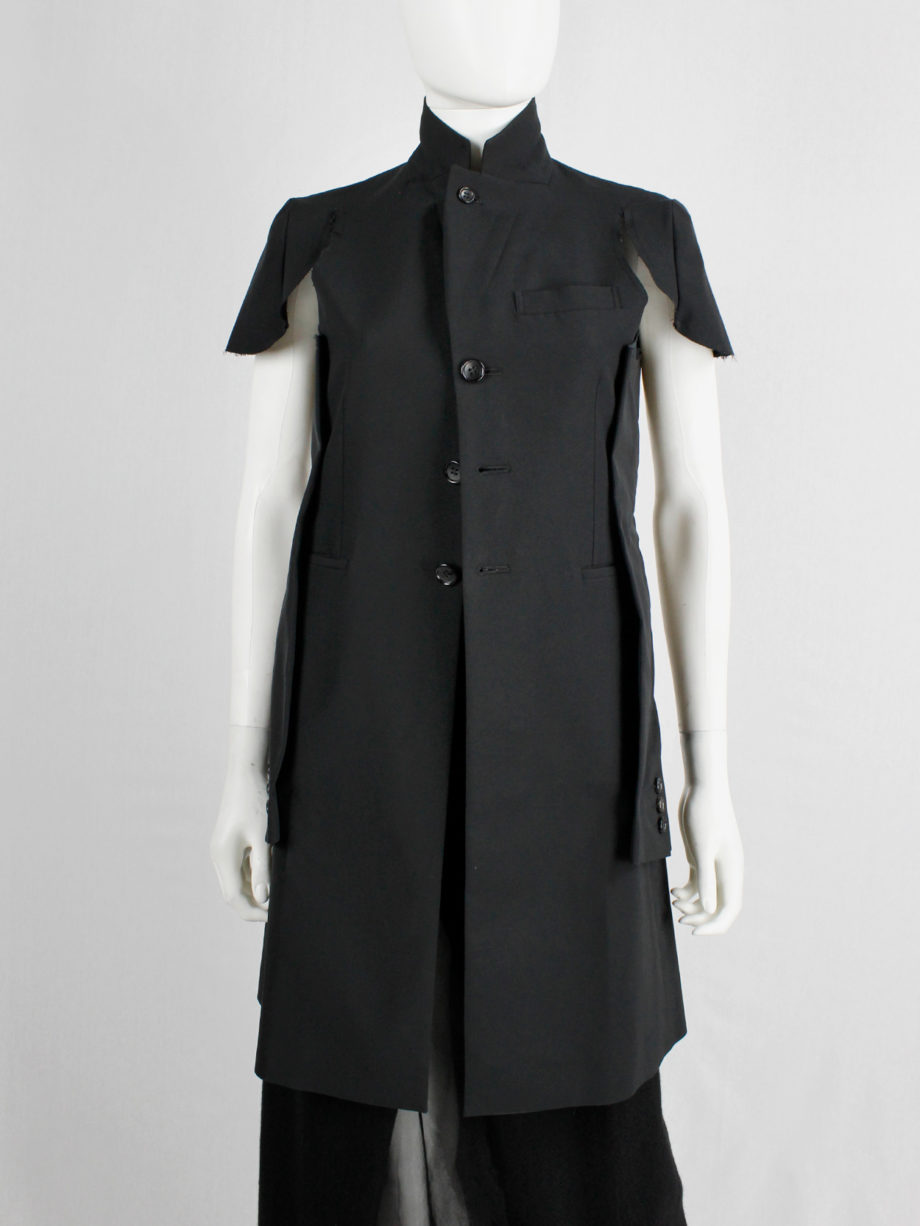 Comme des Garcons black deconstructed jacket with cut off sleeves sewn on the sides spring 2012 (24)