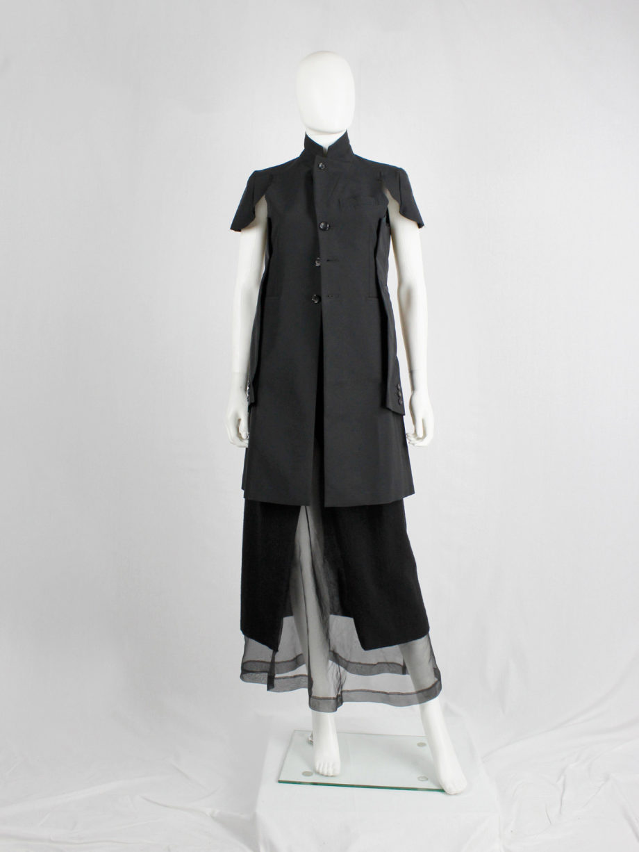 Comme des Garcons black deconstructed jacket with cut off sleeves sewn on the sides spring 2012 (28)