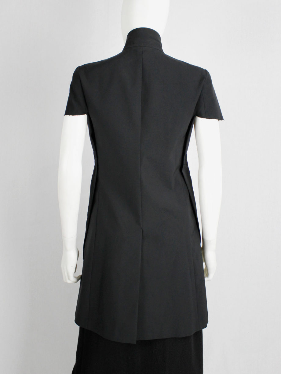 Comme des Garcons black deconstructed jacket with cut off sleeves sewn on the sides spring 2012 (6)