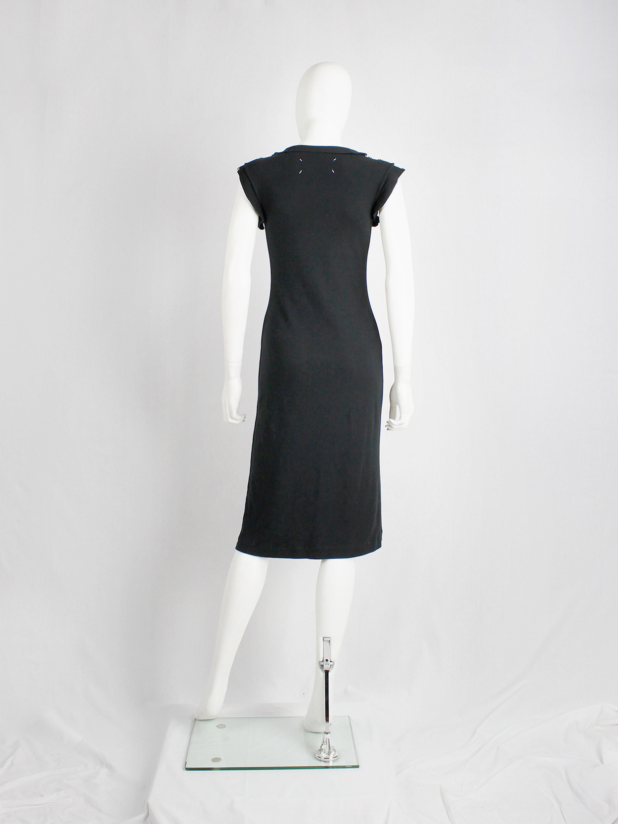 Maison Martin Margiela reproduction of a 1993 black dress with shoulder ...