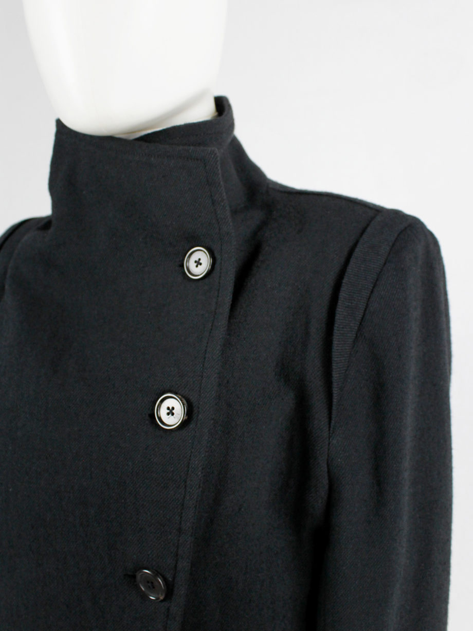Ann Demeulemeester black coat with standing neckline and asymmetric button closure fall 2010 (11)