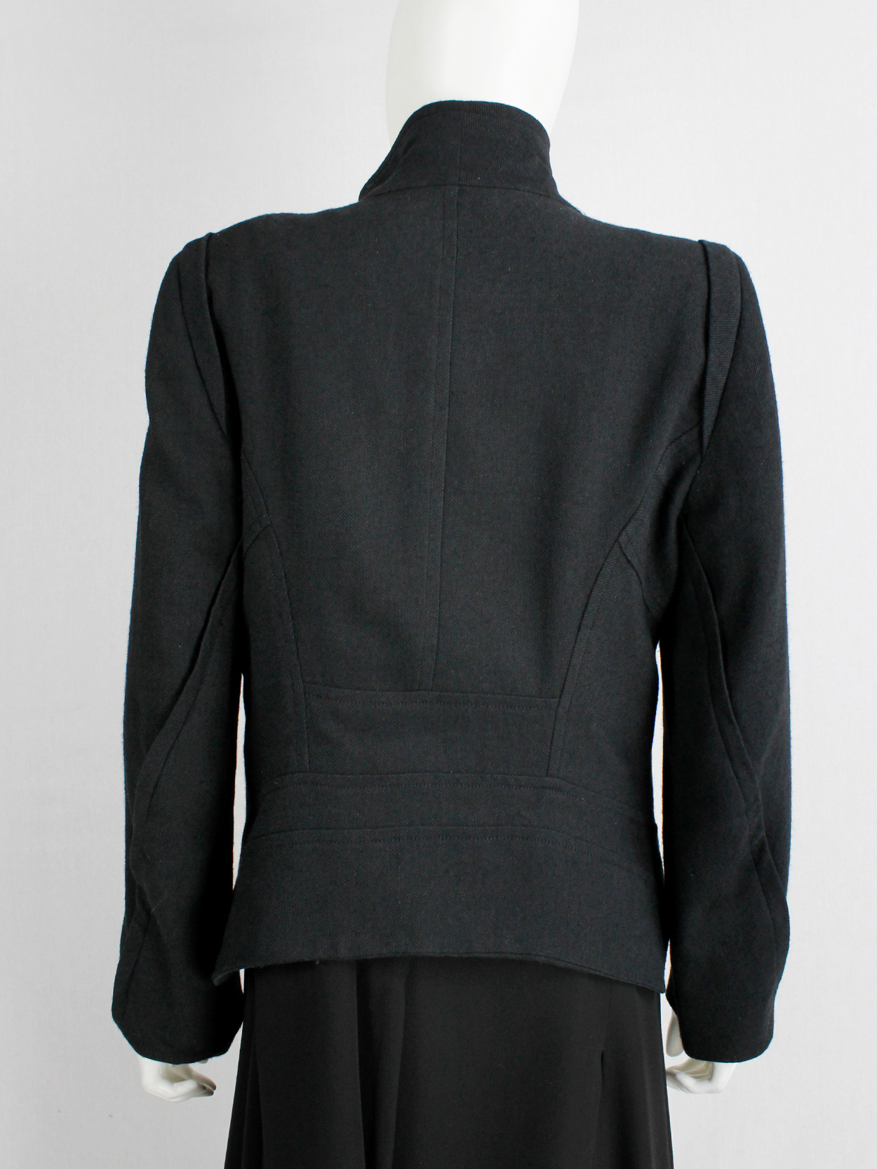 Ann Demeulemeester black coat with standing neckline and asymmetric ...