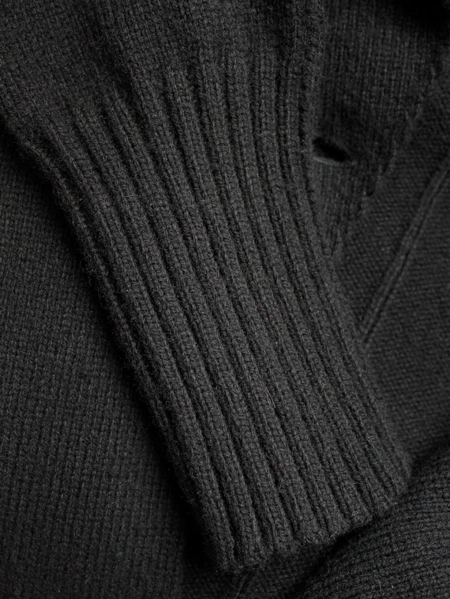 Ann Demeulemeester black long cutaway jumper with curved button closure fall 2005 (10)