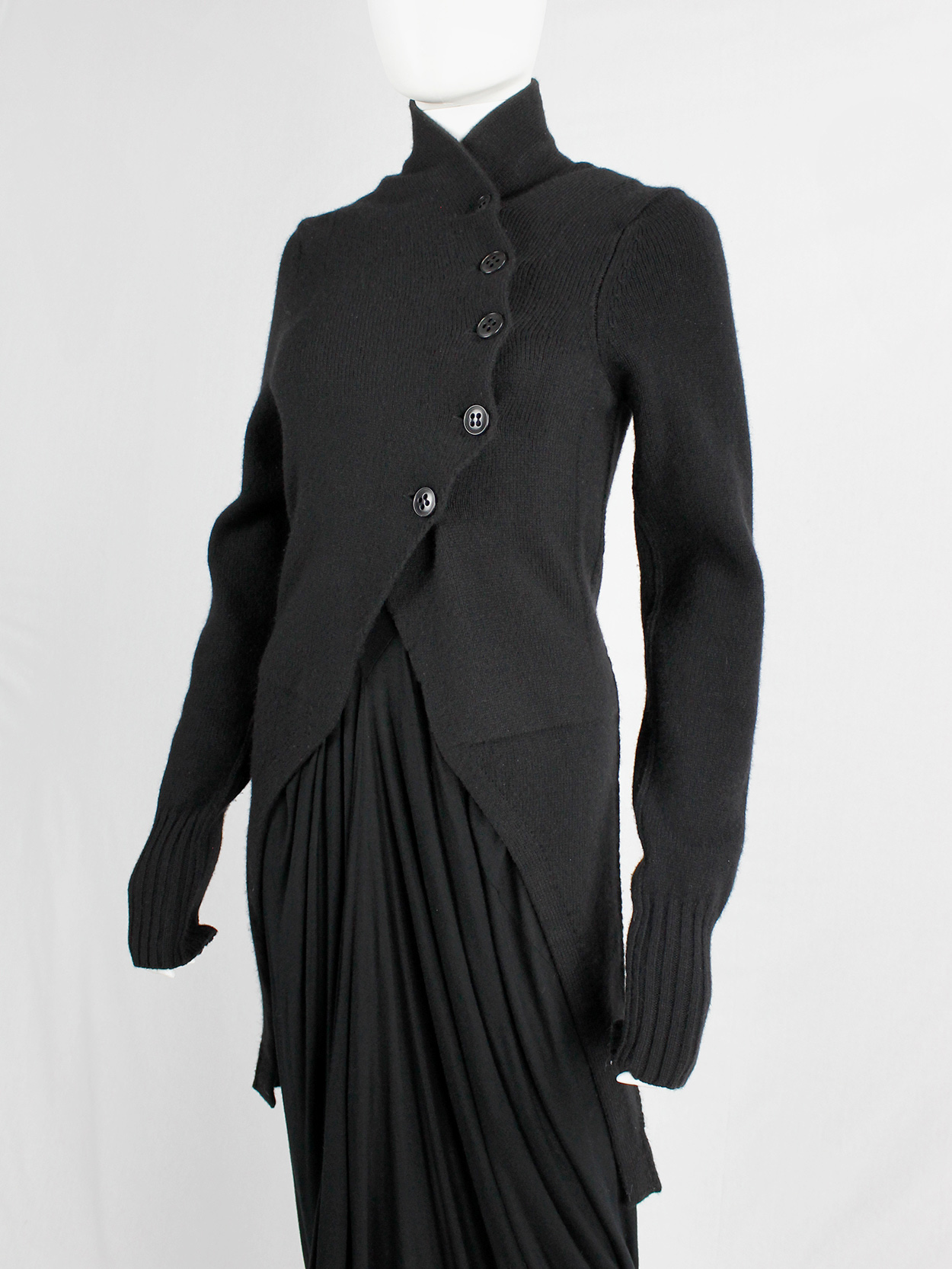 Ann Demeulemeester black long cutaway jumper with curved button closure ...