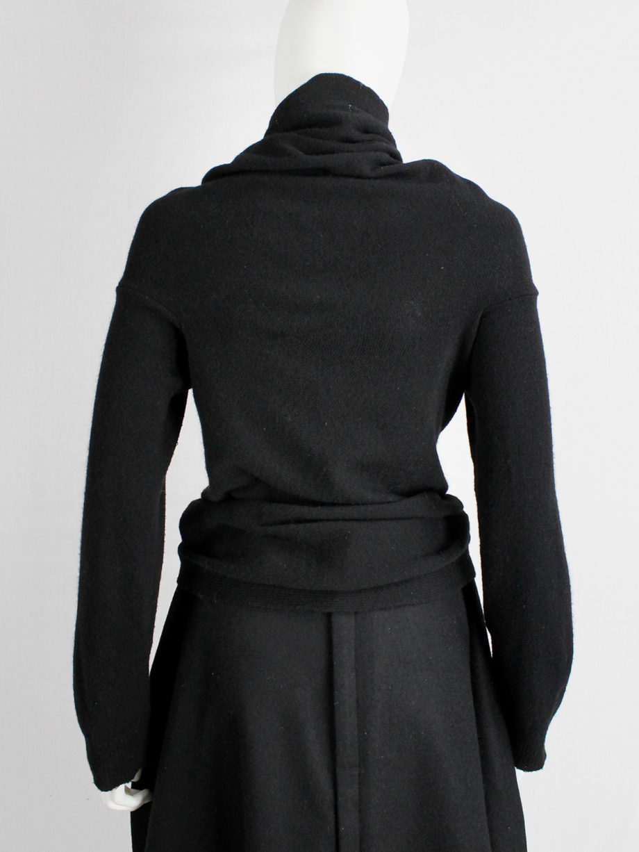 Comme des Garçons black circular jumper with orange buttons and cutaway front fall 2002 (16)