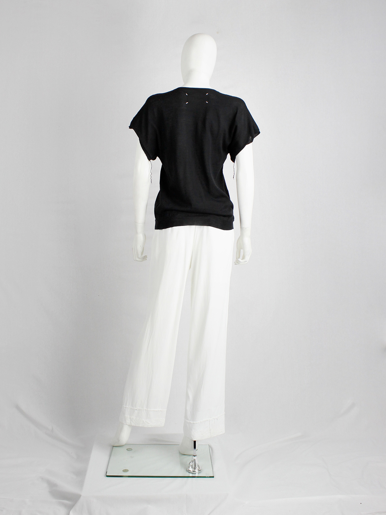 Maison Martin Margiela black t-shirt with cut open sleeves and hanging ...