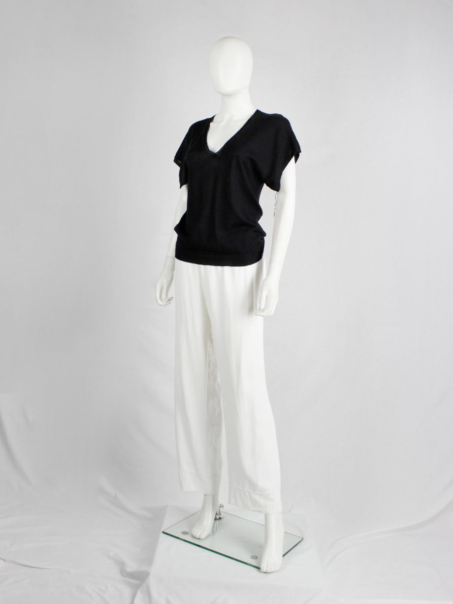 Maison Martin Margiela black t-shirt with cut open sleeves and hanging loose threads spring 2003 (5)