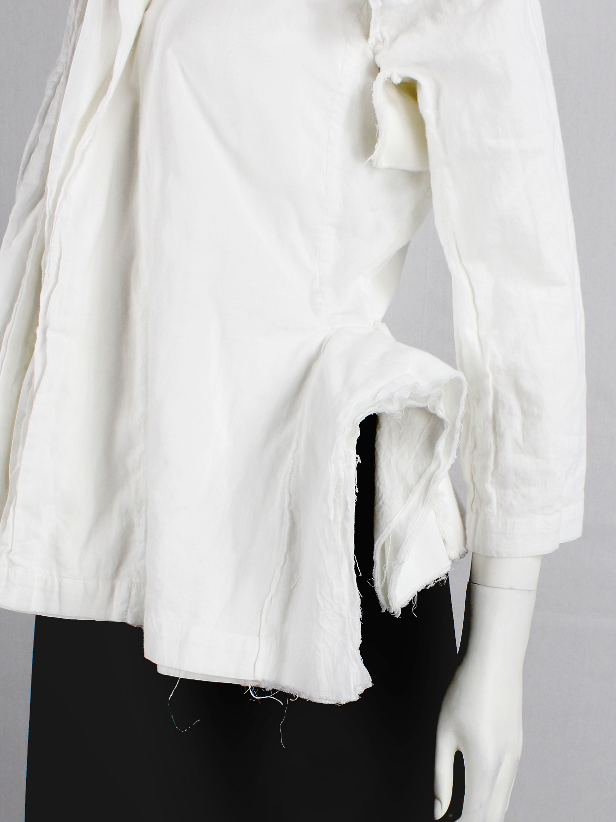 Junya Watanabe white blazer made of 8 blazers layered over each other ...