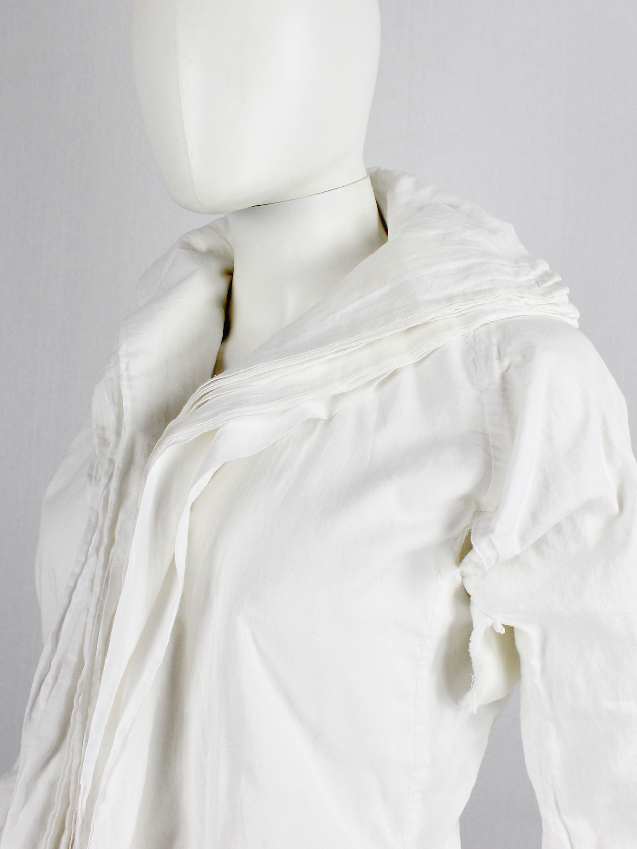 Junya Watanabe white blazer made of 8 blazers layered over each other ...