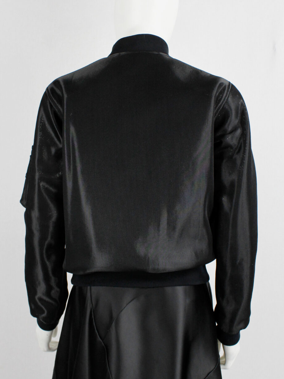 Noir Kei Ninomiya black bomber jacket with belted strap across the chest (4)