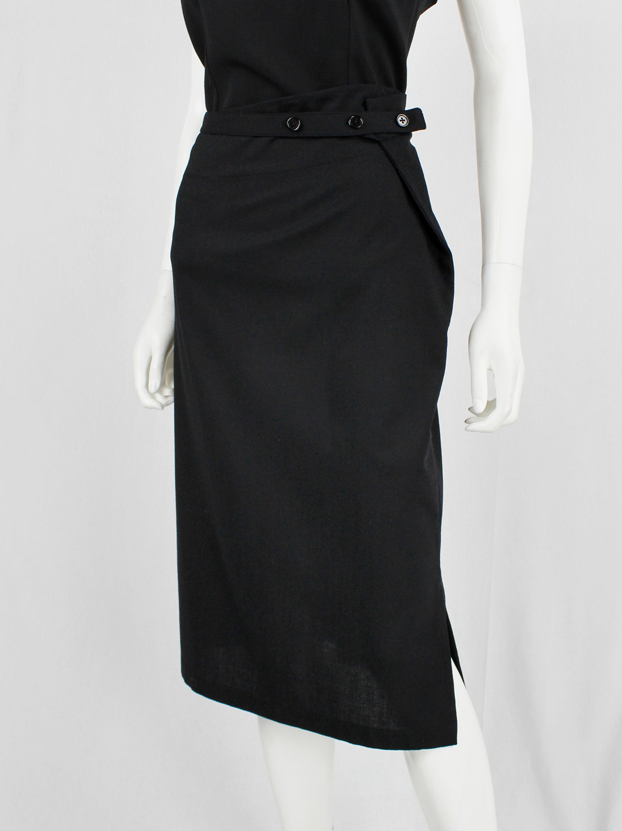 Ann Demeulemeester black midi-skirt with buttoned wrap detail and side ...