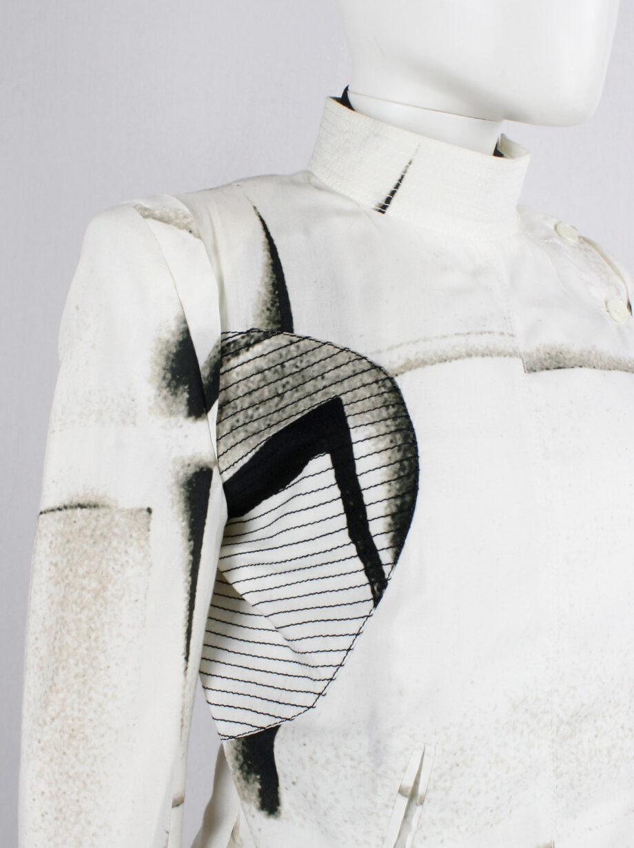 Ann Demeulemeester white buttoned fencing jacket with stitched panels spring 2011 (21)
