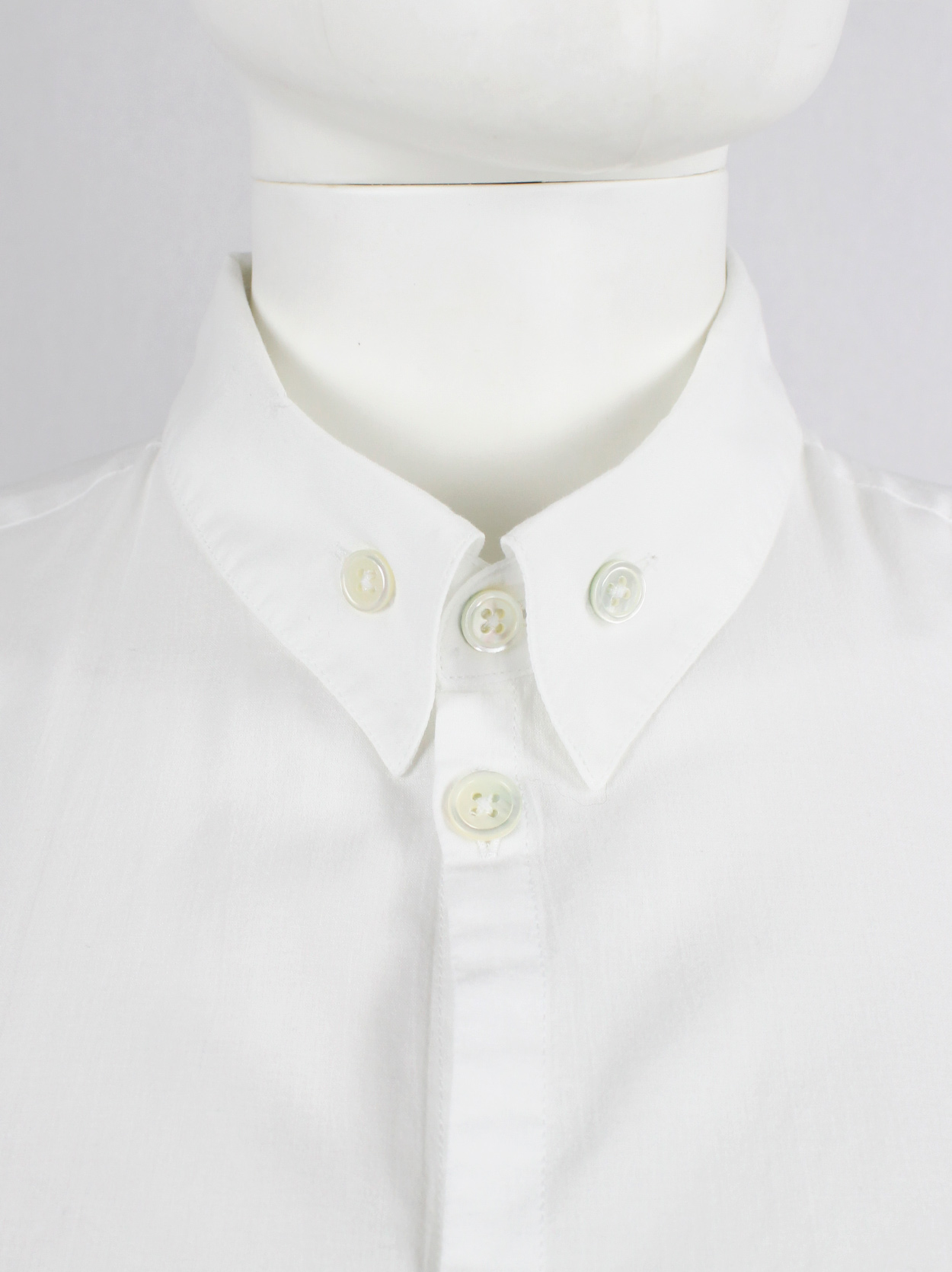 Ann Demeulemeester white shirt with curved hem panel and buttoned ...
