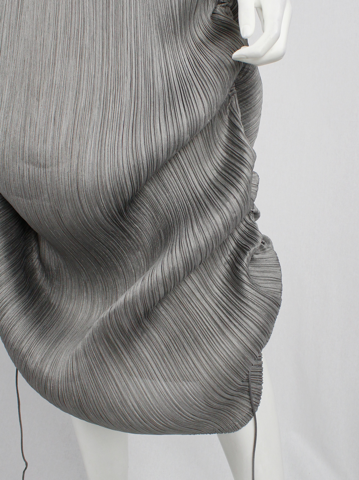 Issey Miyake Pleats Please grey maxi skirt that is scrunched up by ...