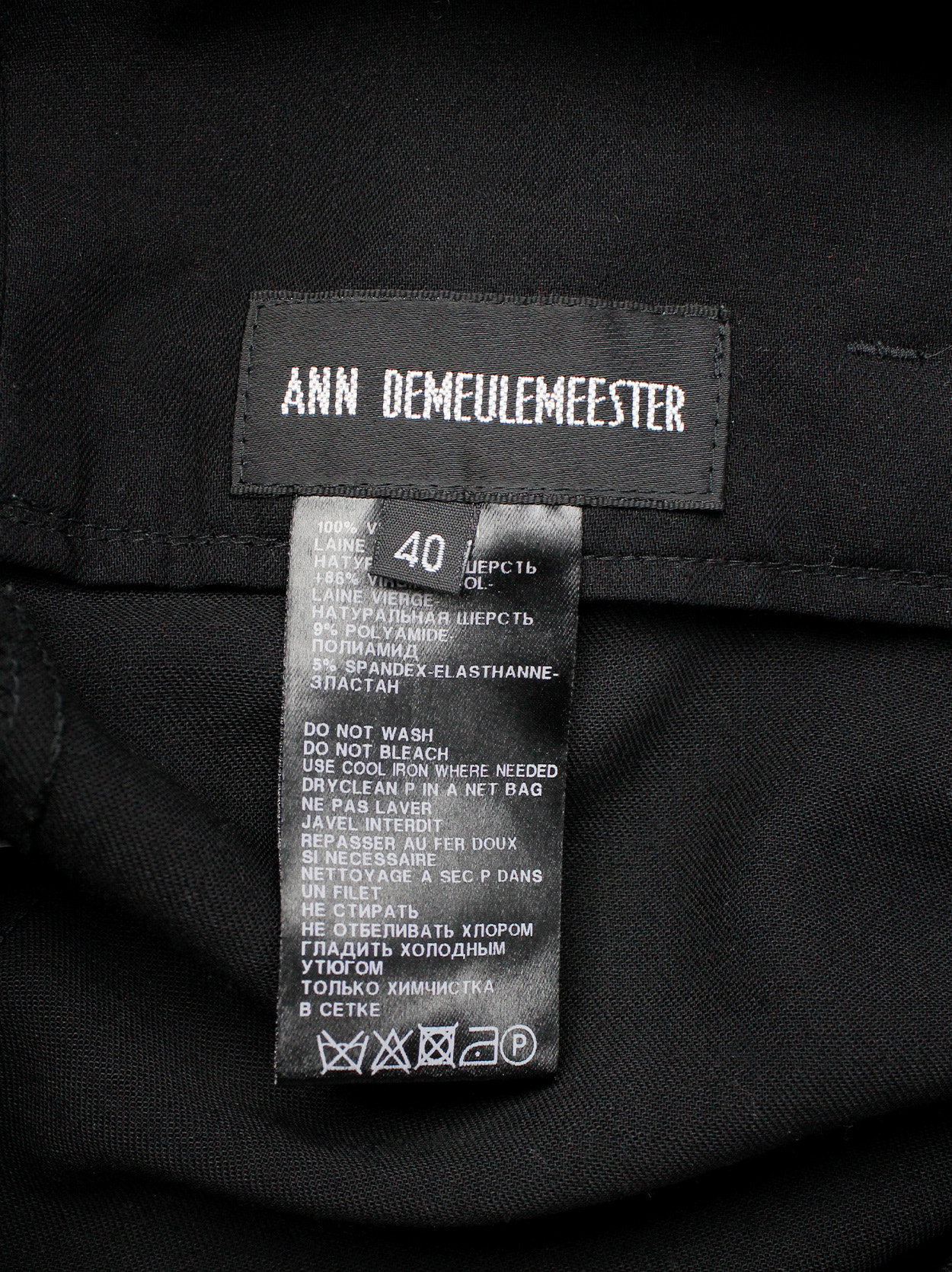 Ann Demeulemeester black harem trousers with front pleat and belt strap ...